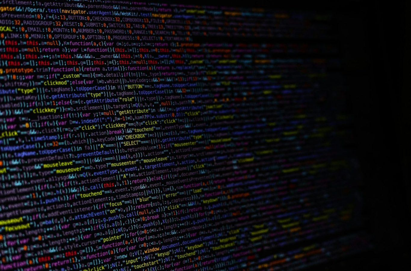 Code zur Automatisierung Bunte, vertikale Linien und Wörter auf schwarzem Hintergrund, die Code oder Daten darstellen.